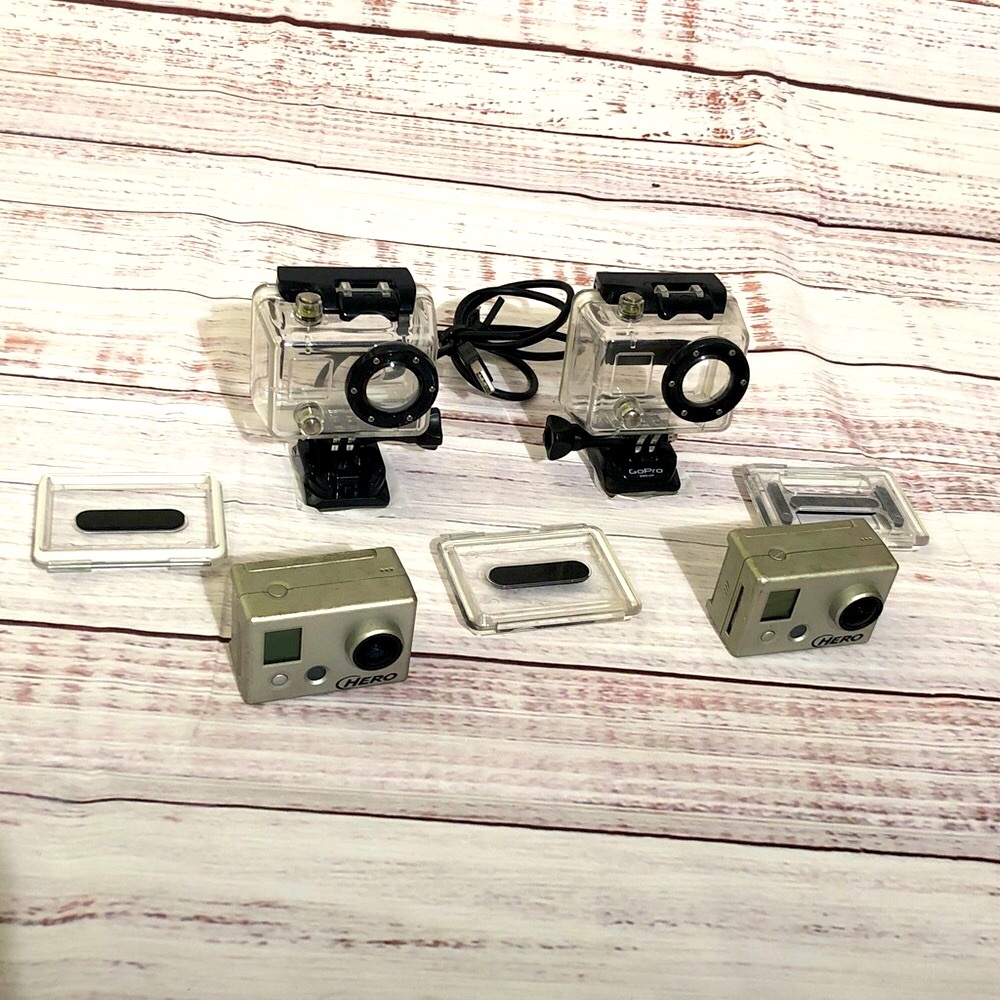 Used GO PRO Hero Cameras for parts with Waterproof Cases no battery